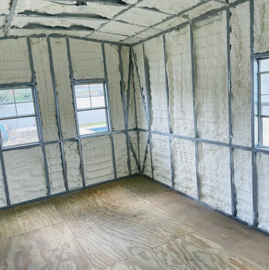 Closed-cell spray foam insulation applied to wall cavities in a residential project in Dulles Town Center